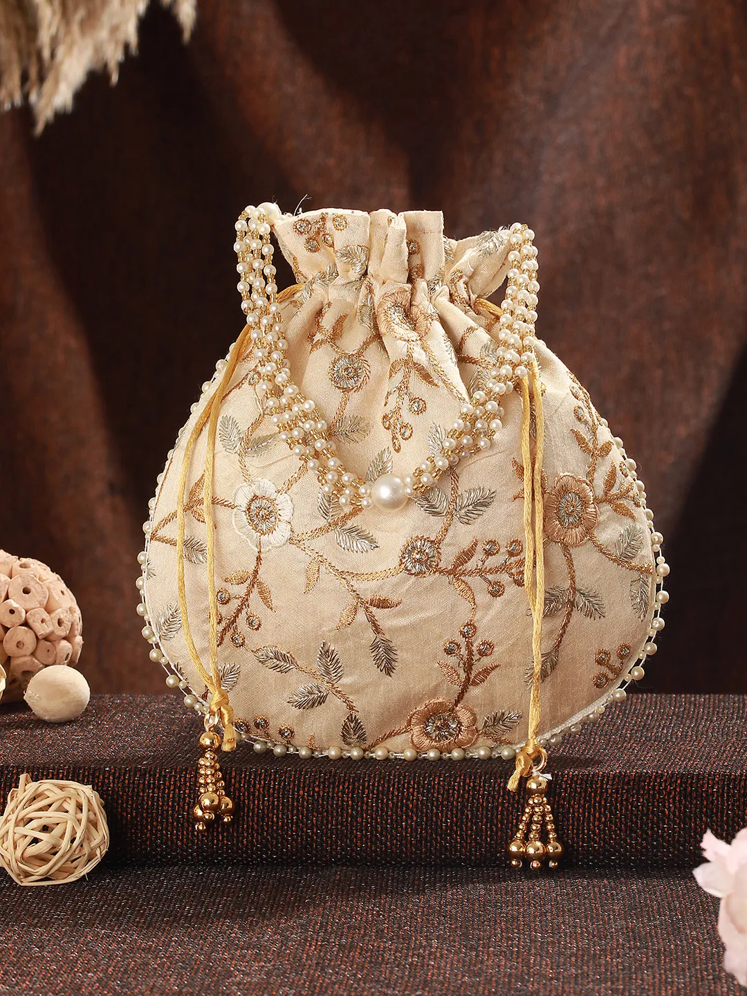 Gold_Toned Classic Potli With Rich Embroidery Clutches